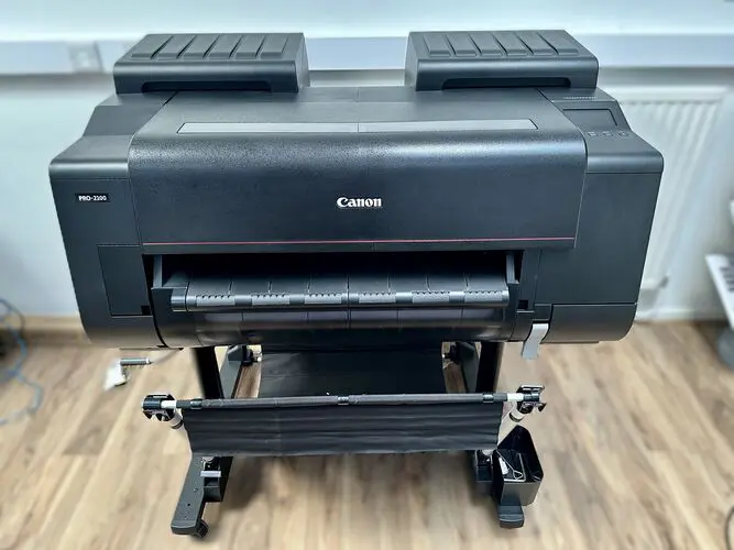 Large format printer printing a colorful poster