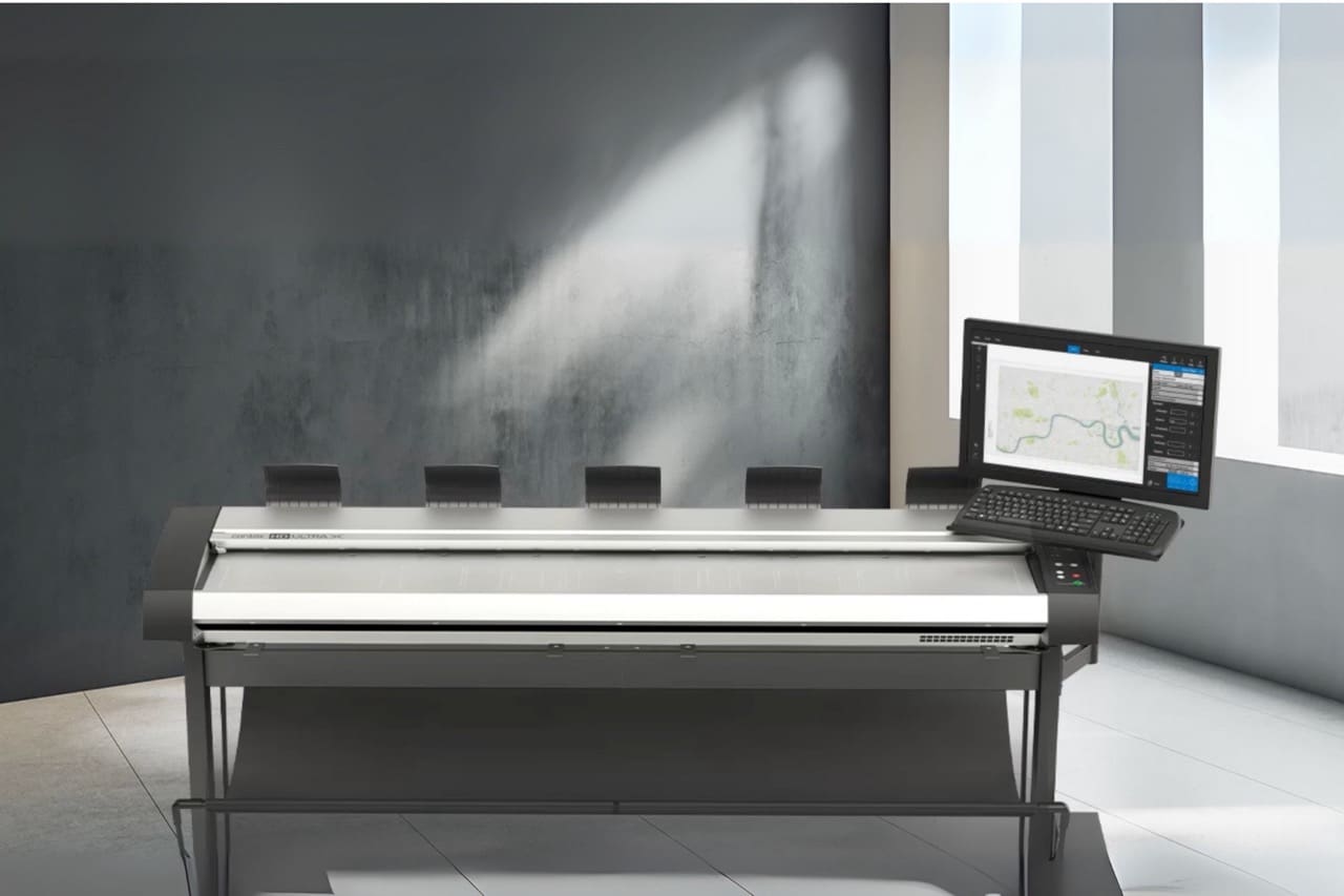 Contex scanner in a modern office setting