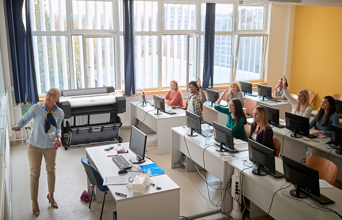 Canon imagePROGRAF TM-610 A0 printer installed in a university computer classroom