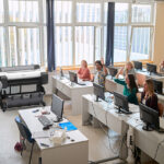 Canon imagePROGRAF TM-610 A0 printer installed in a university computer classroom